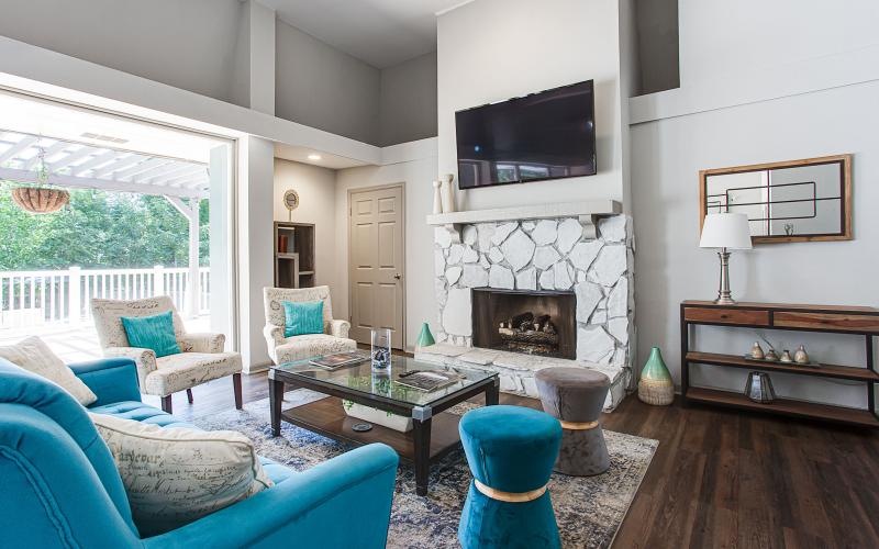 a living room with a fireplace