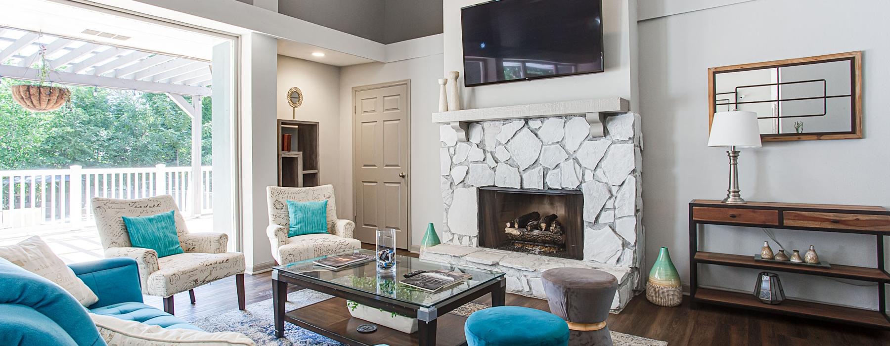 a living room with a fireplace