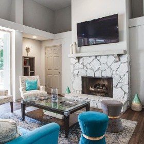 a living room with a fireplace