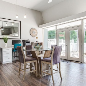 a dining room with a wood floor