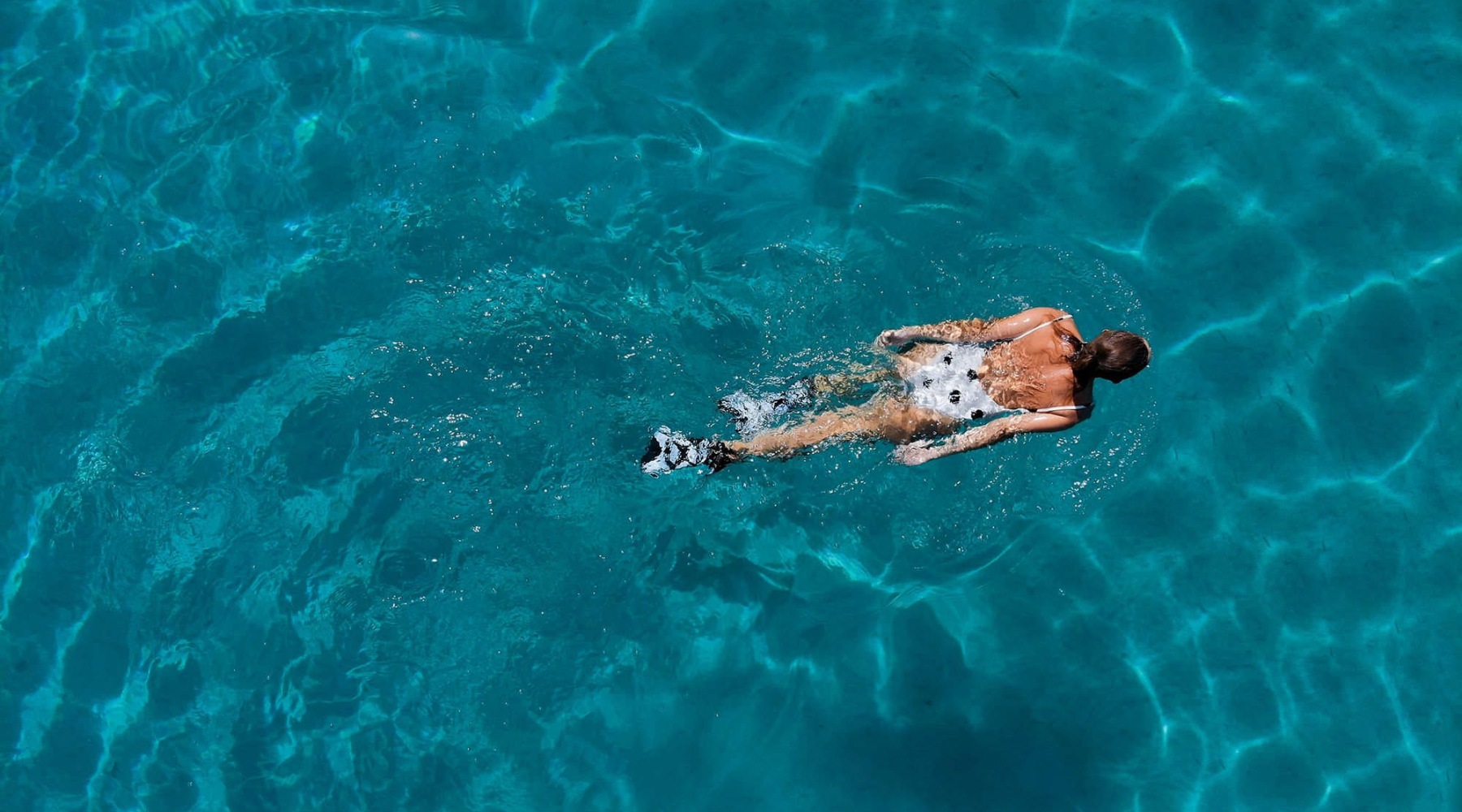 woman swimming in pool